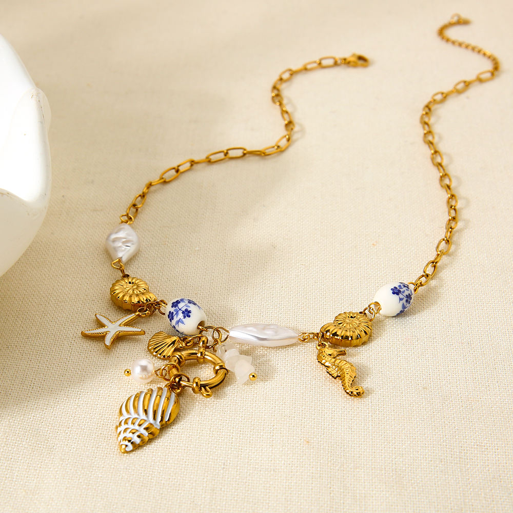 Mystiquè Oceanic Charm Necklace | Gold-Plated Pearl & Shell Pendant