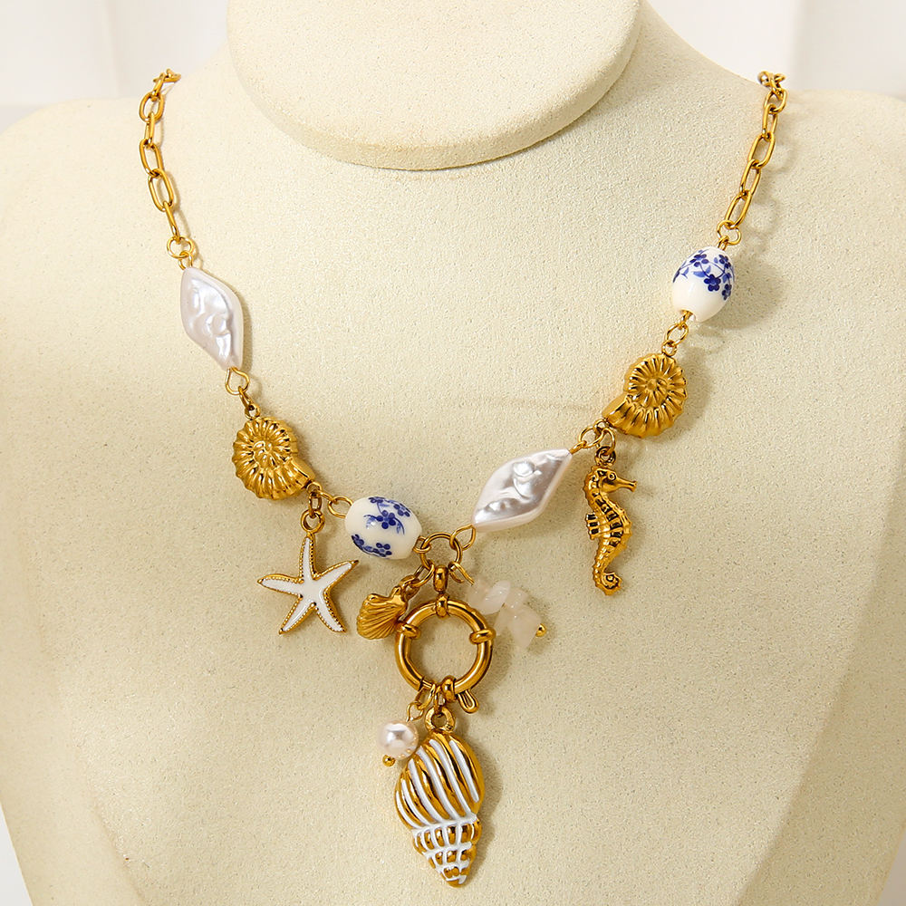 Mystiquè Oceanic Charm Necklace | Gold-Plated Pearl & Shell Pendant