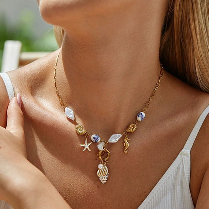 Mystiquè Oceanic Charm Necklace | Gold-Plated Pearl & Shell Pendant