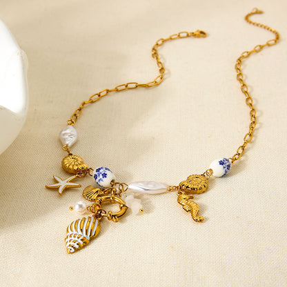 Mystiquè Oceanic Charm Necklace | Gold-Plated Pearl & Shell Pendant