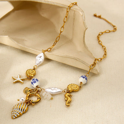 Mystiquè Oceanic Charm Necklace | Gold-Plated Pearl & Shell Pendant